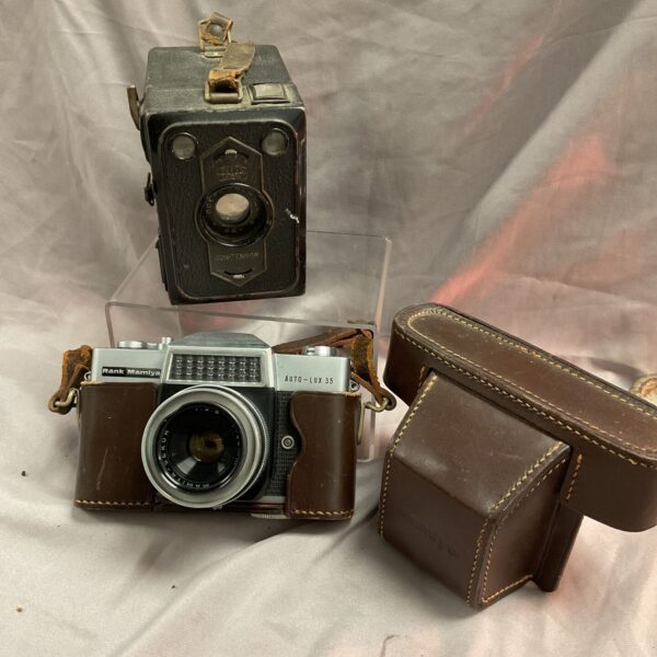 Vintage camera lot featuring Zeiss Ikon and Rank Kamiya Auto Lux.