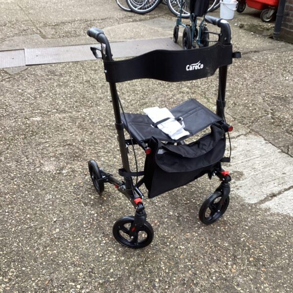 Careco walking aid trolley with seat and basket.