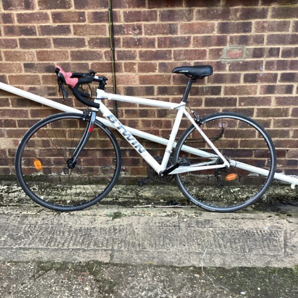 Btwin Triban 300 racing bike, a used road bicycle.
