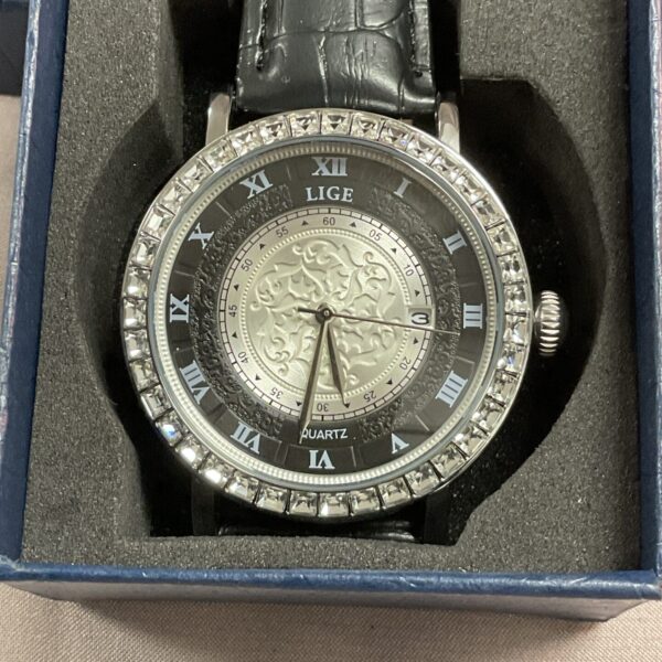 Black dial Lige quartz wristwatch with leather strap.