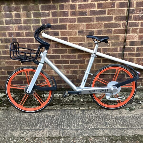 Vintage bicycle with a front basket, a classic retro style.