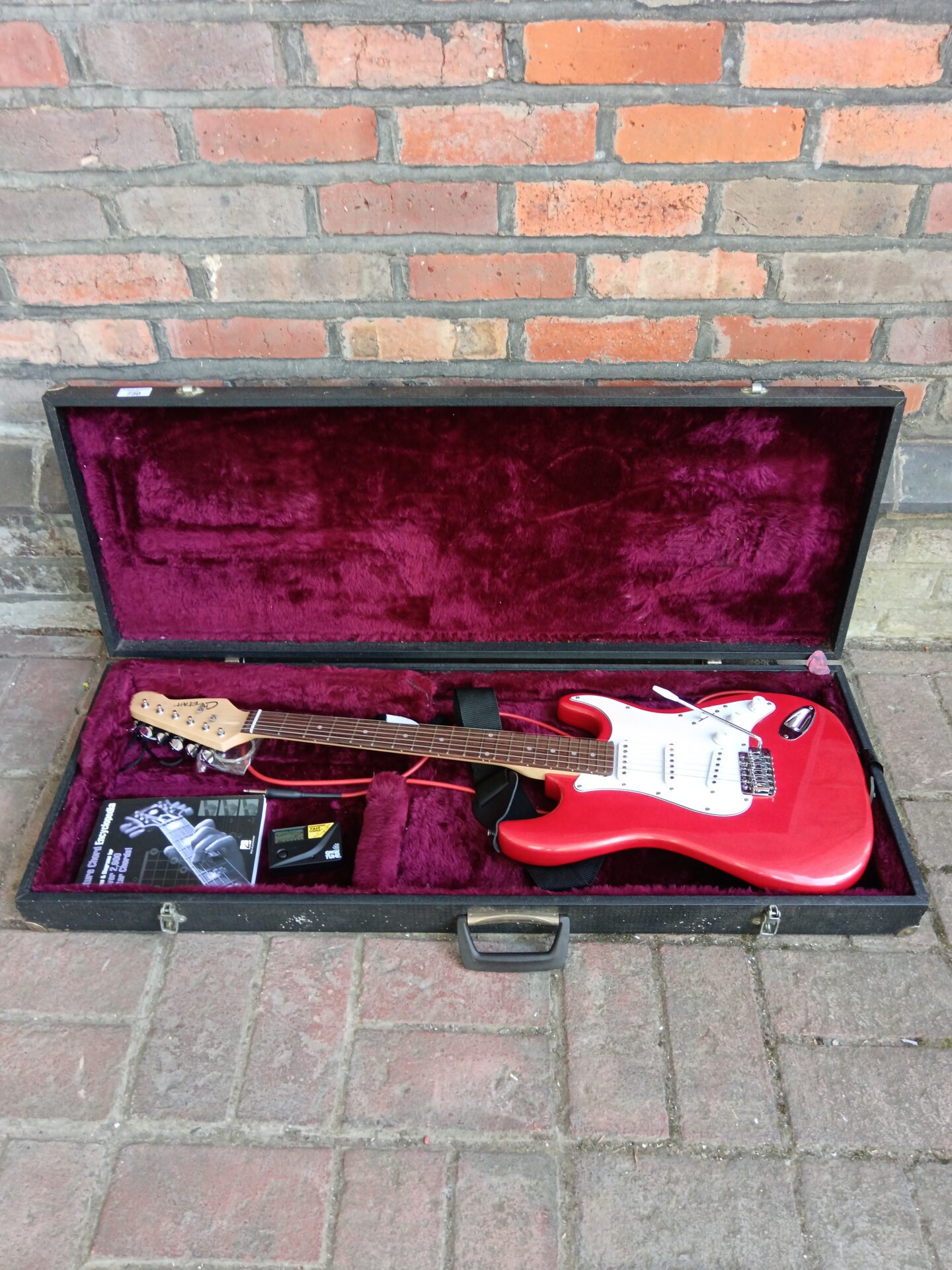 730 Red cheetah electric guitar in lined case