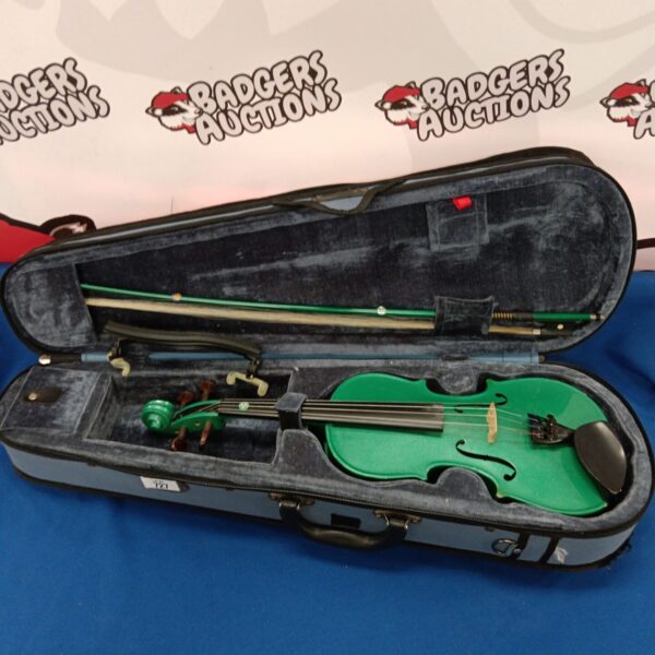 Green Stentor Harlequin violin in open case with bow.
