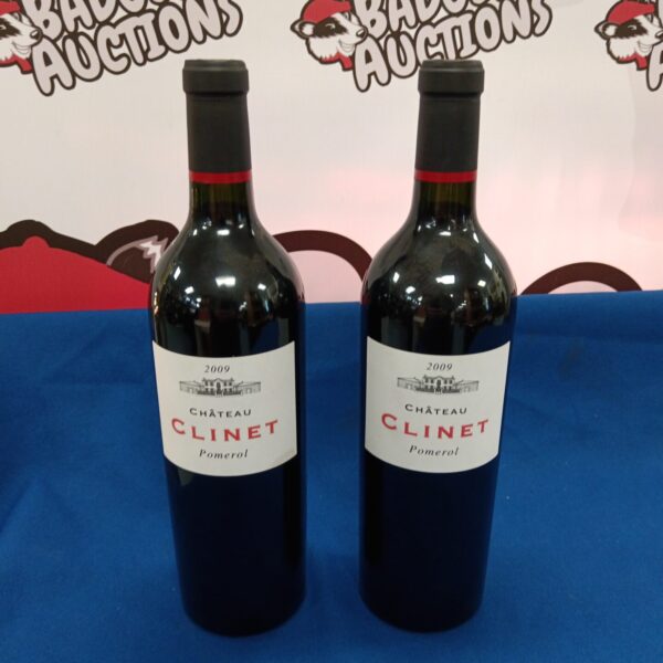 Two bottles of Chateau Clinet Pomerol 2009 red wine.