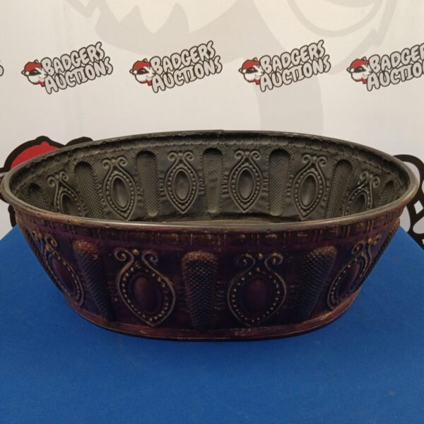Vintage tin Indian pattern basin with embossed design.