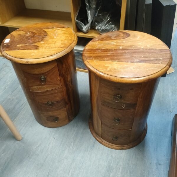 Pair of solid sheesham drum chests with three drawers.