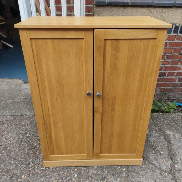 Vintage solid oak shoe cabinet for hall storage.