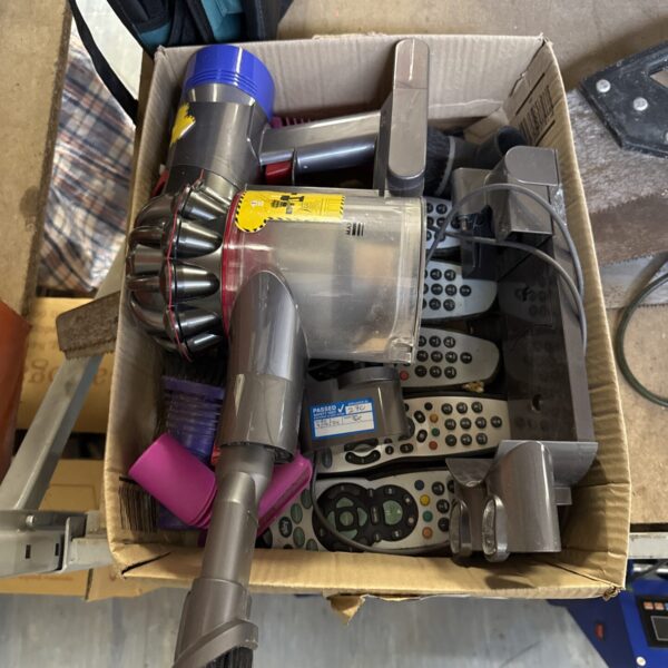 Dyson V8 cordless vacuum cleaner with Sky remotes included.