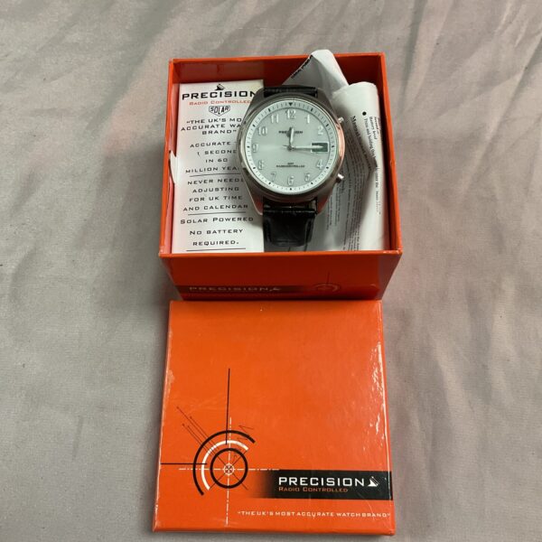 Precision radio control watch with digital display for accurate timekeeping.