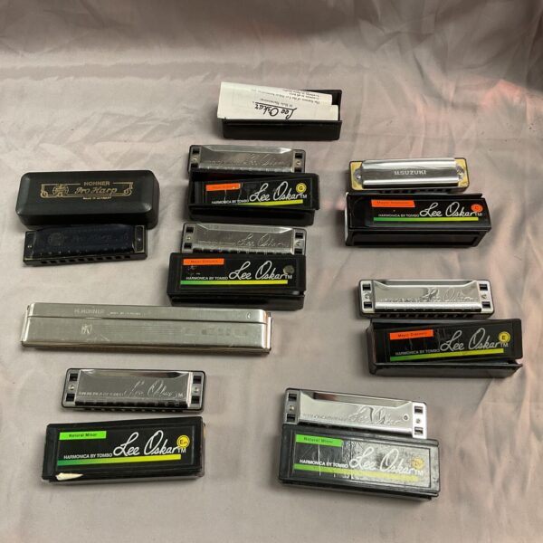 Vintage Lee Oskar and Hohner harmonica collection for musicians and collectors.