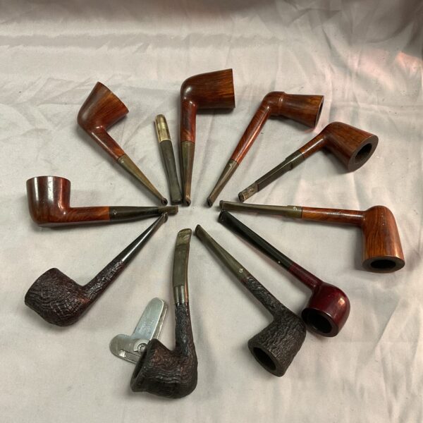 Vintage smoking pipes collection, antique briar pipes for collectors.