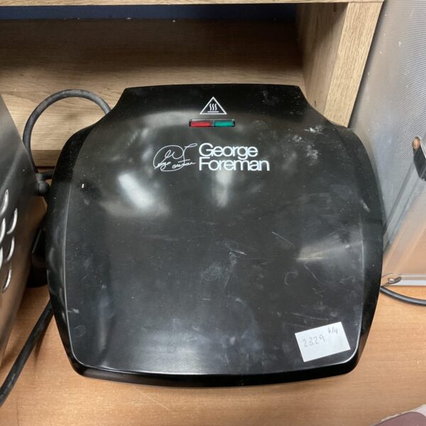 Vintage George Foreman grill, a classic kitchen appliance.