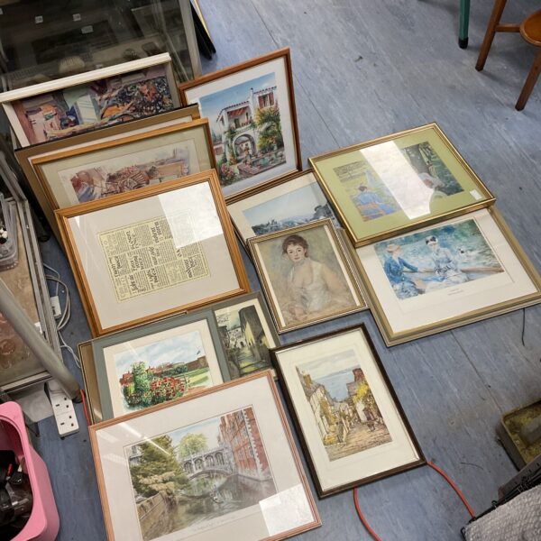 Large lot of assorted framed prints and artwork for wall decor.