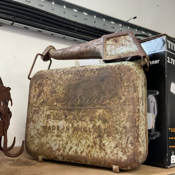Vintage Eversure fuel can, showing signs of age and wear.