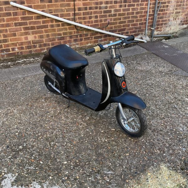 Used Razor scooter in grey, ideal for collectors or restoration.