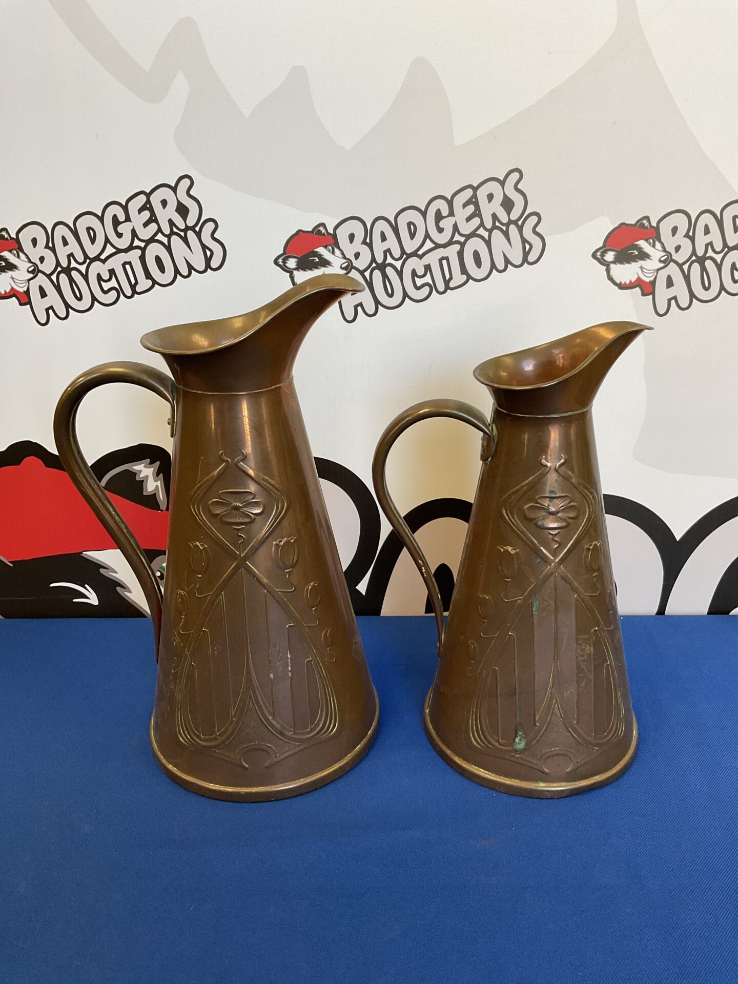 047 Pair of joseph sankey & son art nouveau copper pitchers