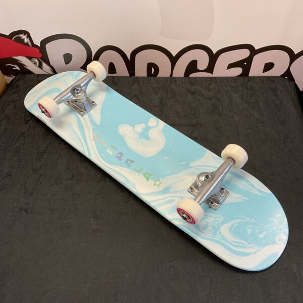 Top view of the Impala Cosmos skateboard with marble deck.