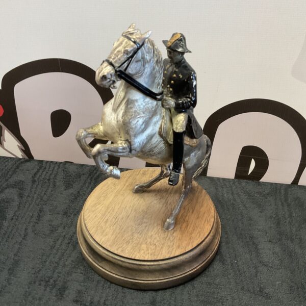 Vintage Napoleonic soldier statue on a white horse, detailed cold paint.