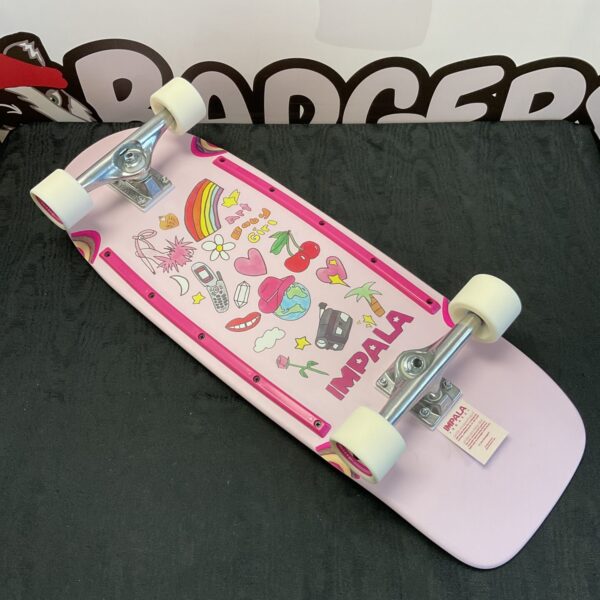 Pink Impala Latis art skateboard with playful illustrations.