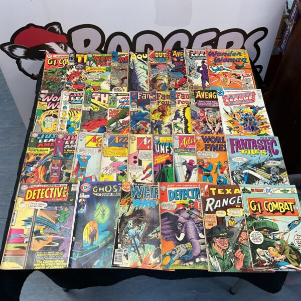 Vintage lot of Marvel and DC superhero comics from the 1970s and 1980s.