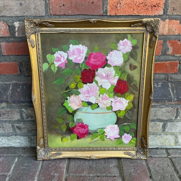 Vintage floral still life oil painting with flowers in a vase.