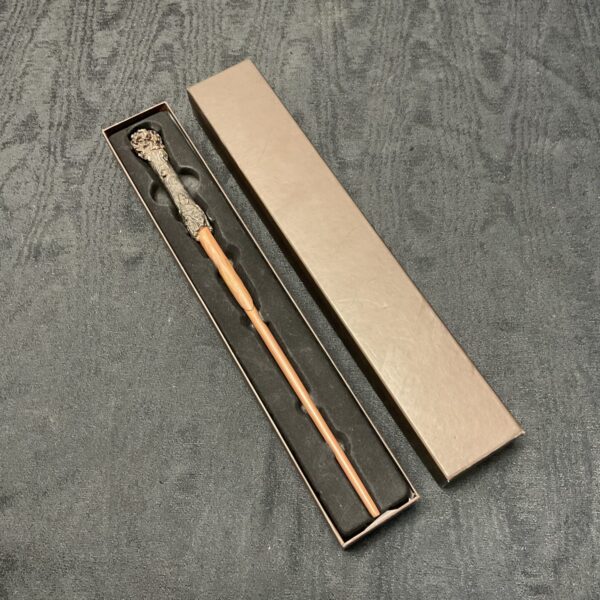 Detailed Harry Potter wand replica with display box.