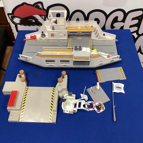 Playmobil boat car transporter with landing port for toy vehicles.