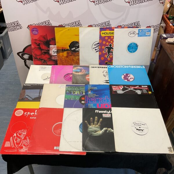 Collection of dance music vinyl records, including drum and bass.