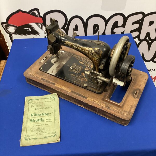 Vintage Frister & Rossman vibrating shuttle sewing machine in good condition.