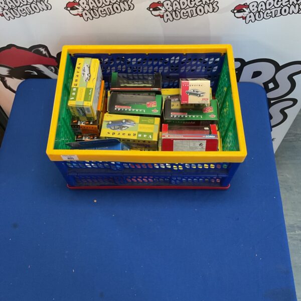 Crate of boxed Vanguard diecast model cars for collectors.