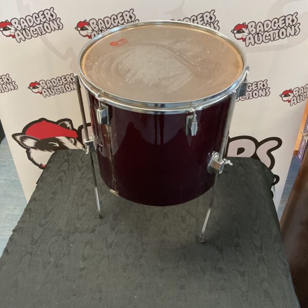 Vintage floor tom drum with lacquer finish and minor wear.