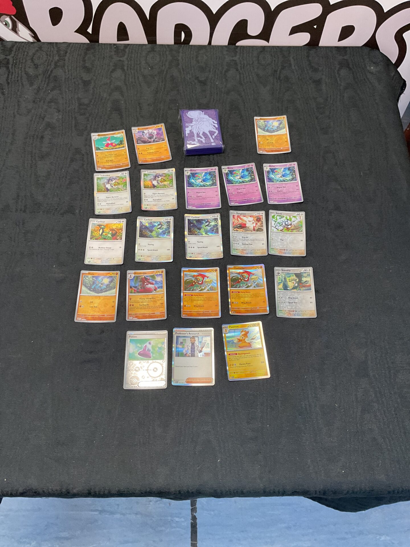100 Selection of pokemon holo cards with pack of sleeves