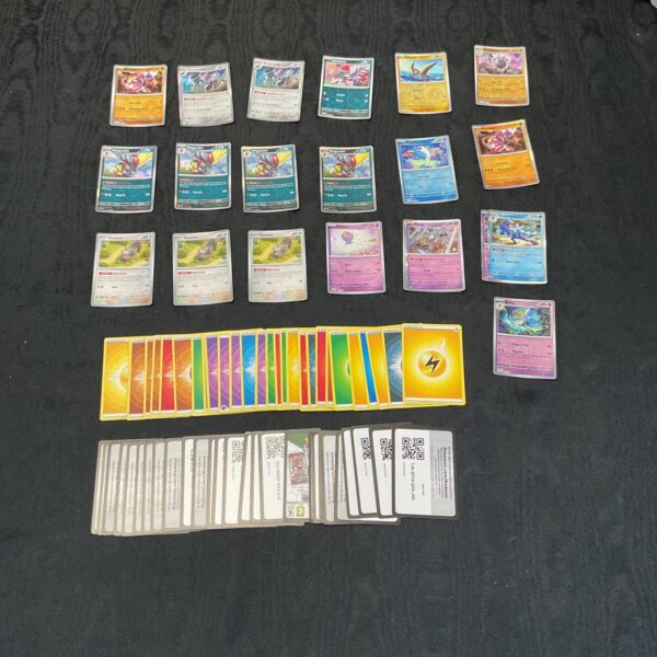 Pokemon card lot with holo and redeem cards for collectors.
