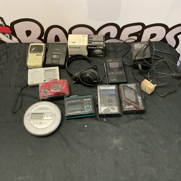 Vintage camera and cassette lot including Sony, Casio, and Philips.