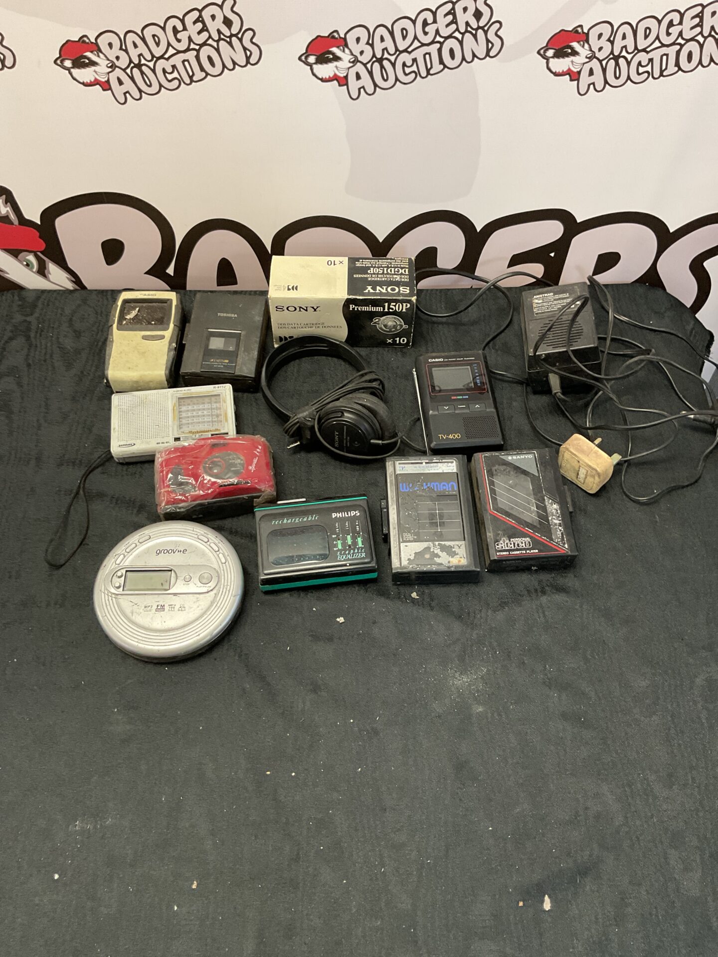 118 Tray of retro cameras and cassettes inc sony, casio, toshiba and phillips