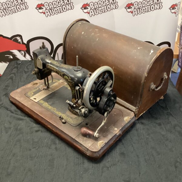 Vintage Bradbury V.S sewing machine, antique collectible for display.