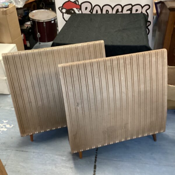 Vintage Quad electrostatic load speakers in a home setting.