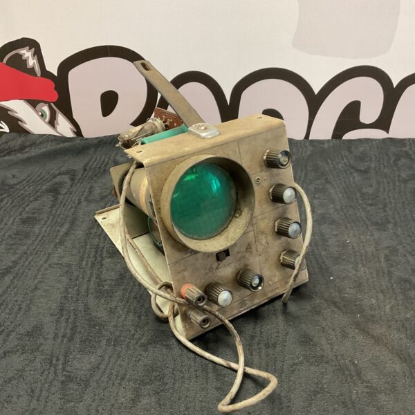Front view of a vintage military valve oscilloscope with circular screen.