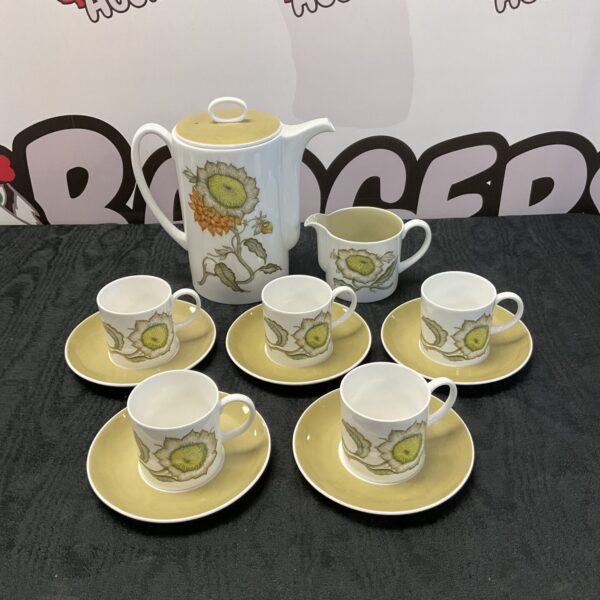 Vintage Susie Cooper Wedgwood coffee set with floral design.