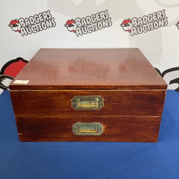 Front view of vintage wooden drawers for desk organisation.