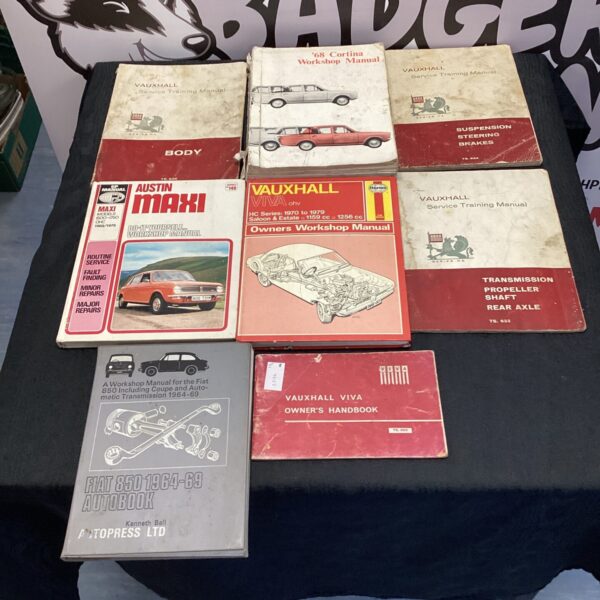 Vintage Vauxhall service manual cover, showing diagrams and model information.