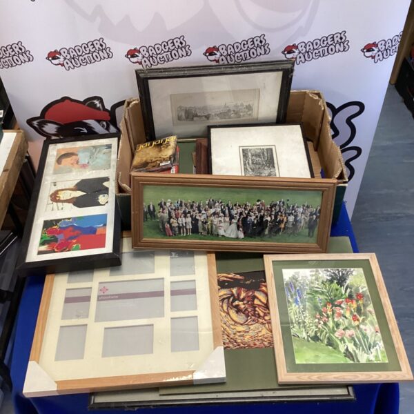 Box of picture frames with photos