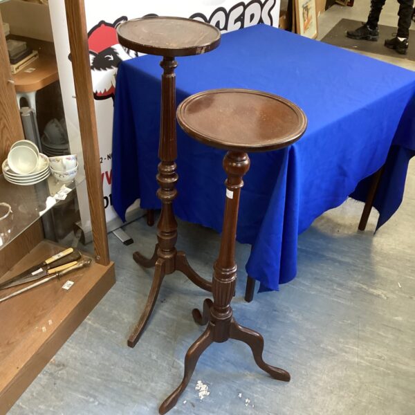 Antique Victorian mahogany jardiniere stands, ideal for plant display.