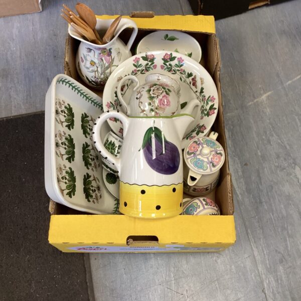 Vintage floral china collection with teacups and saucers.