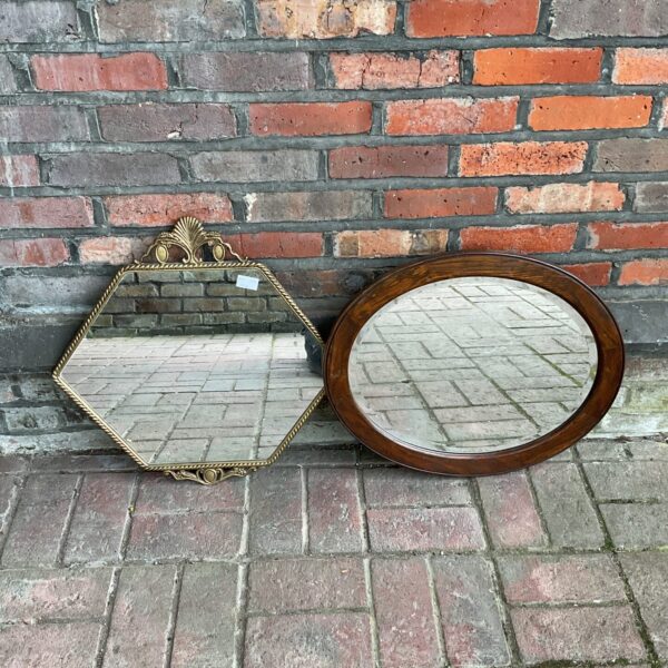 Vintage oak framed bevelled edge mirror for wall decoration.