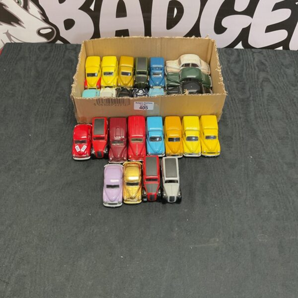 Collection of vintage Morris Minor diecast models and Lledo cars.