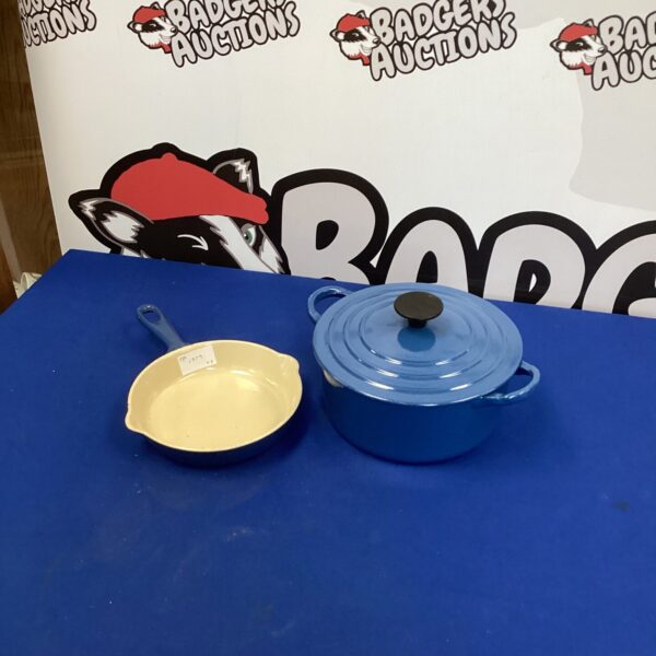 Vibrant blue Le Creuset pan, cast iron enamel cookware.