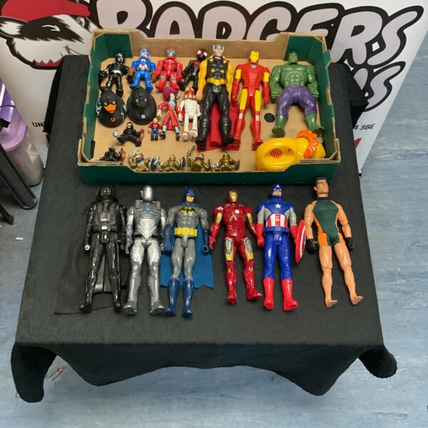 Vintage action figure lot with Fisher Price, Hasbro, and Marvel toys.