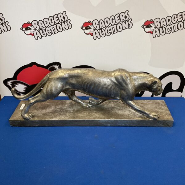 Modern resin leopard sculpture for home decor and animal art collectors.