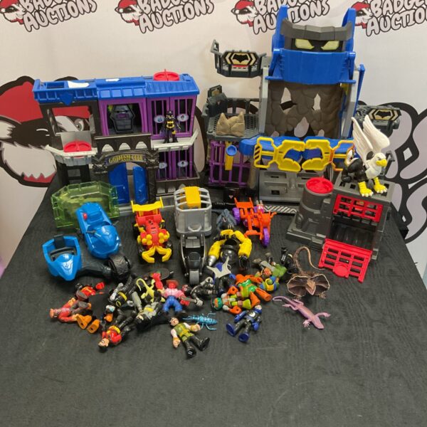 Imaginex Batman playsets and DC figures in a collectible lot.